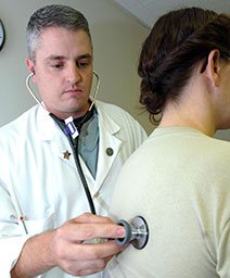 doctor examining a patient